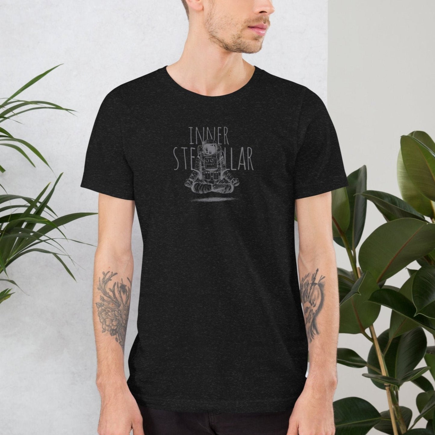 floating meditating astronaut in lotus position with inner stellar messaging behind him on male model