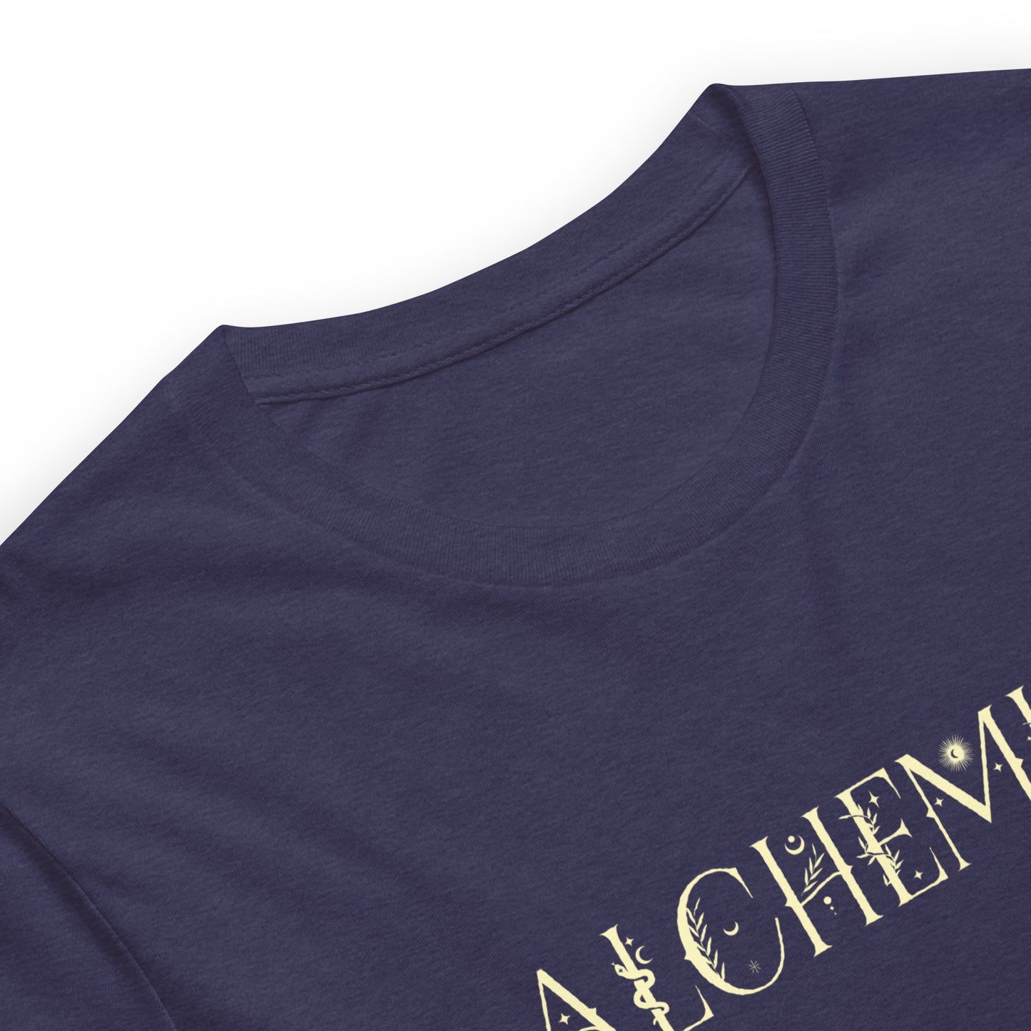 close up of Midnight navy color heather tee that says Alchemist in descriptive light yellow type