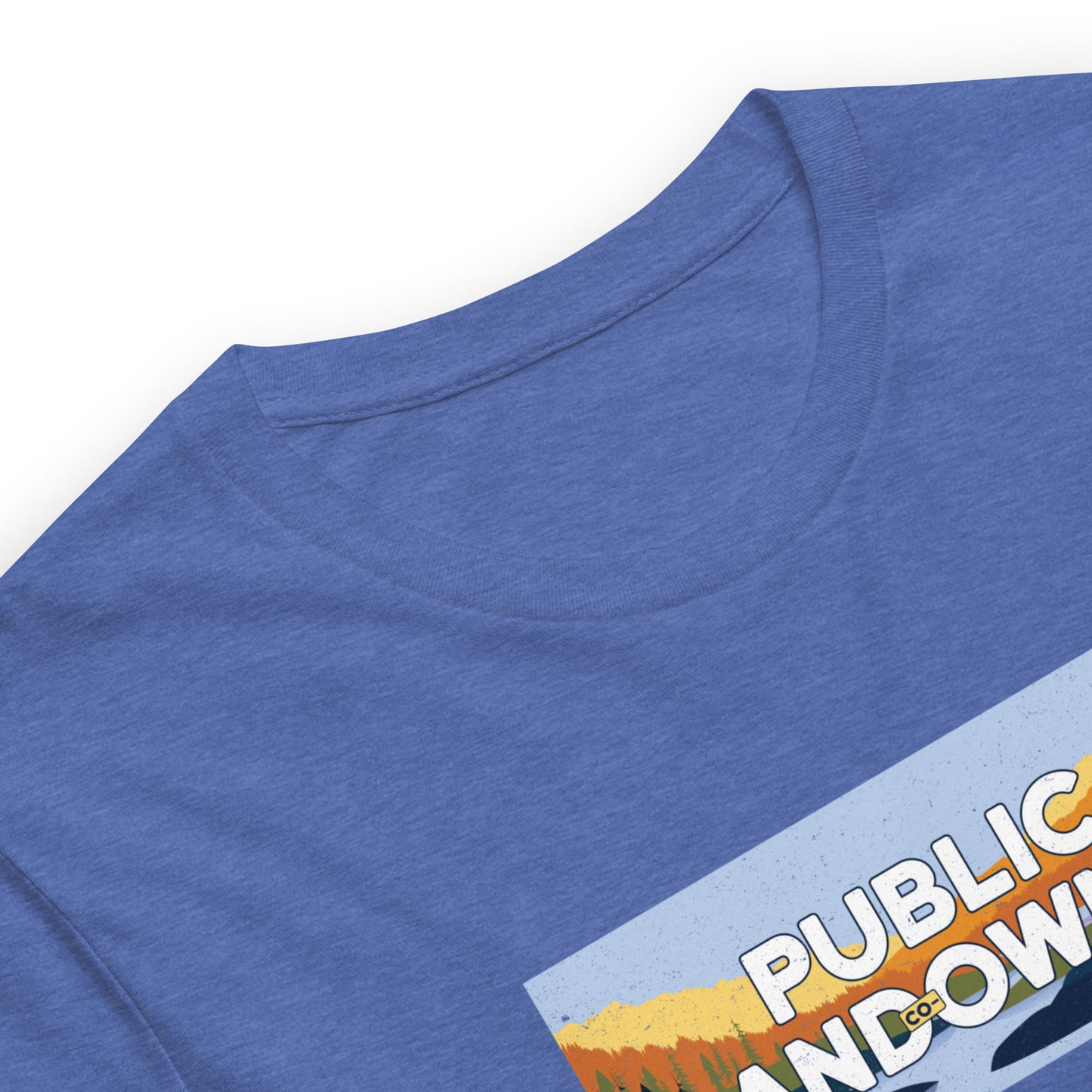 close up of royal blue color heather tee with a rectangle landscape saying Public land co-owner inside