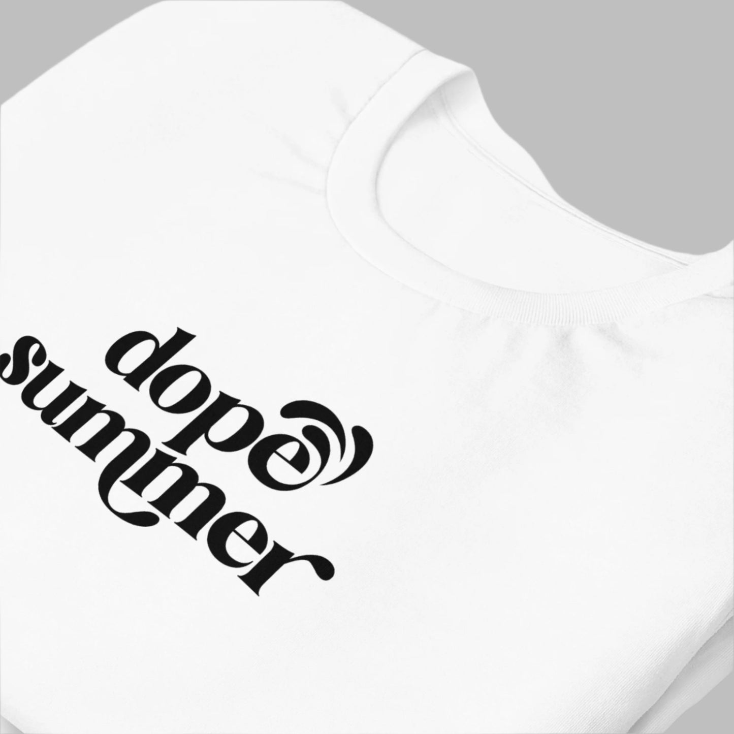White cotton tee with black dope summer text close up.