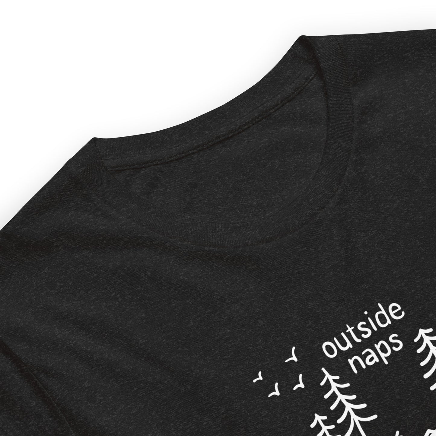 close up of Black heather tee with hand-drawn illustration of a person laying in a hammock in the trees in white