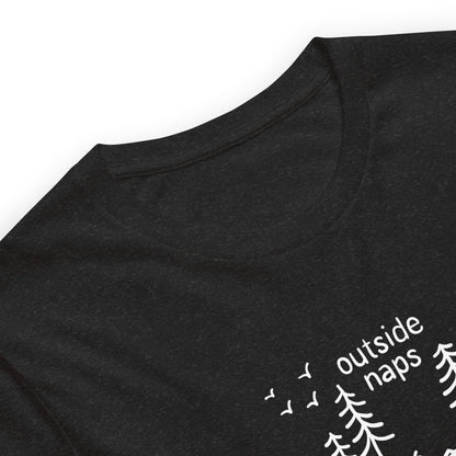 close up of Black heather tee with hand-drawn illustration of a person laying in a hammock in the trees in white