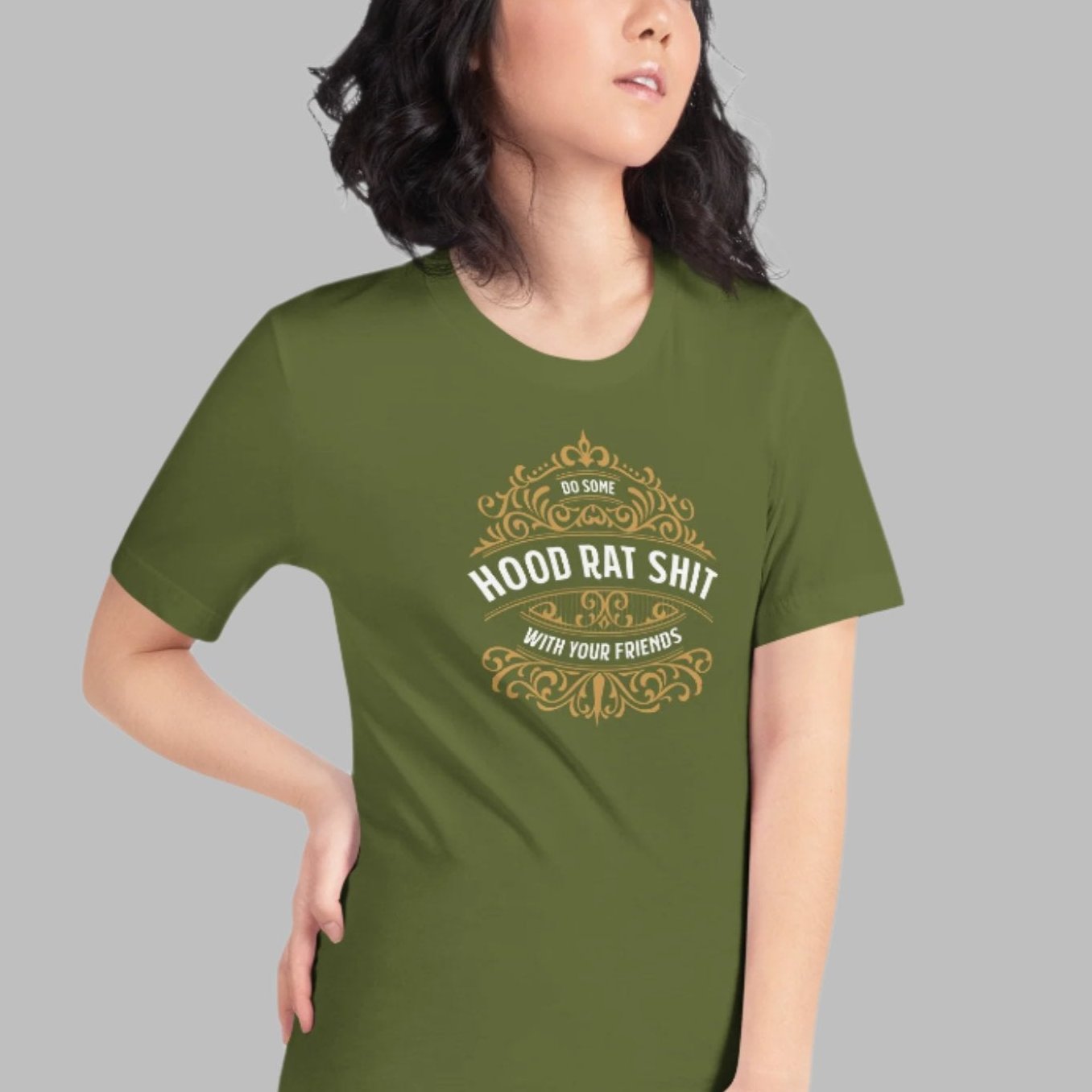 Olive color tee with gold design, Do Some Hood Rat Shit with Your Friends message on front in white on female model